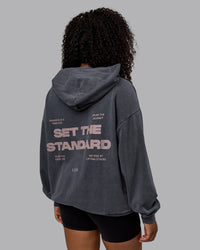 Woman wearing Unisex Washed Set the Standard Hoodie Oversize - Black-Greyish Purple | Thumbnail Index: 6