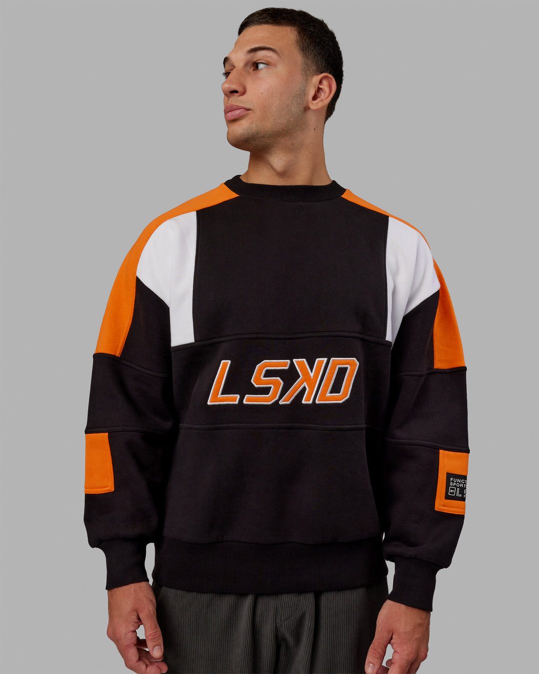 Man wearing Unisex Slam Sweater Oversize - Black-Ultra Orange - view 6