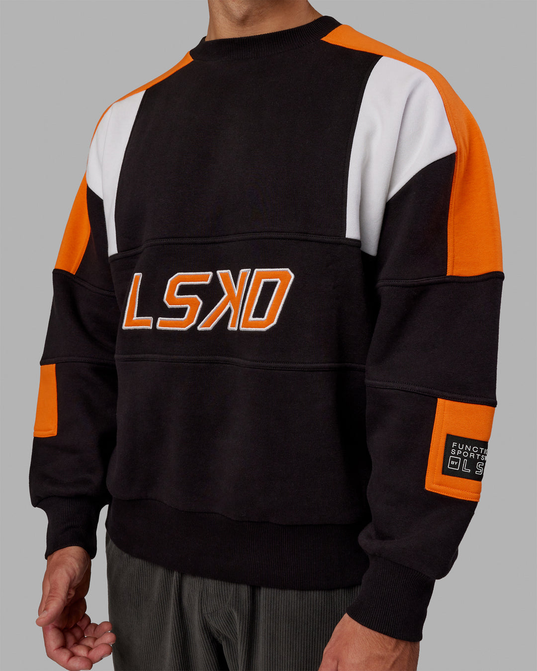 Man wearing Unisex Slam Sweater Oversize - Black-Ultra Orange - view 8