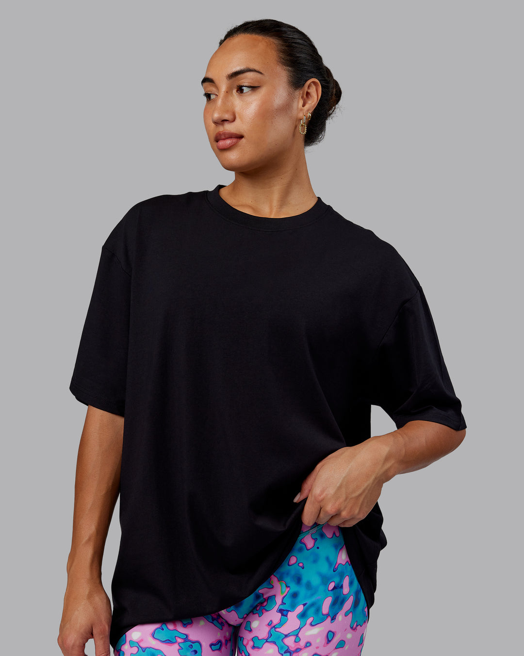 Woman wearing Unisex So Cal 24 FLXCotton Tee Oversize - Black-Beacon Orange - view 4