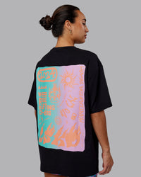 Woman wearing Unisex So Cal 24 FLXCotton Tee Oversize - Black-Beacon Orange | Thumbnail Index: 9