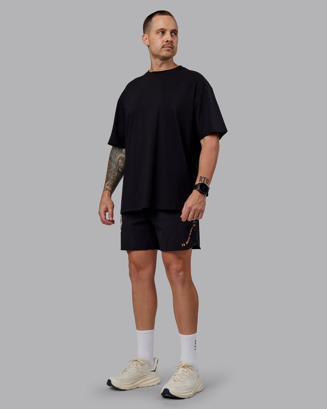 Man wearing Unisex So Cal 24 FLXCotton Tee Oversize - Black-Beacon Orange - view 11