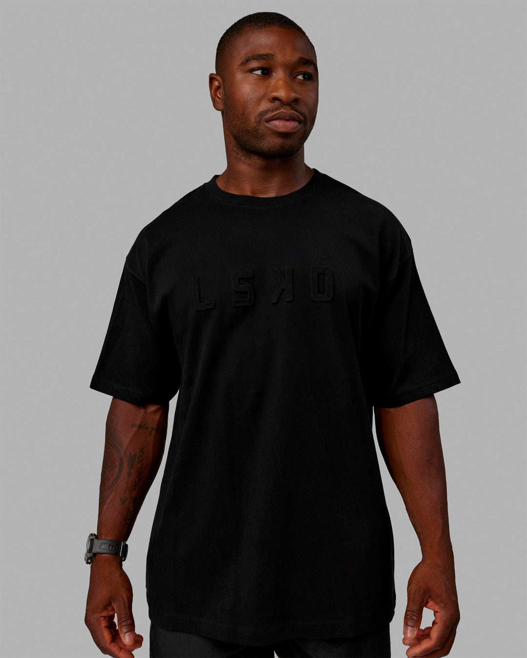 Man wearing Unisex Stamped 2.0 Heavyweight Tee Oversize - Black - view 3