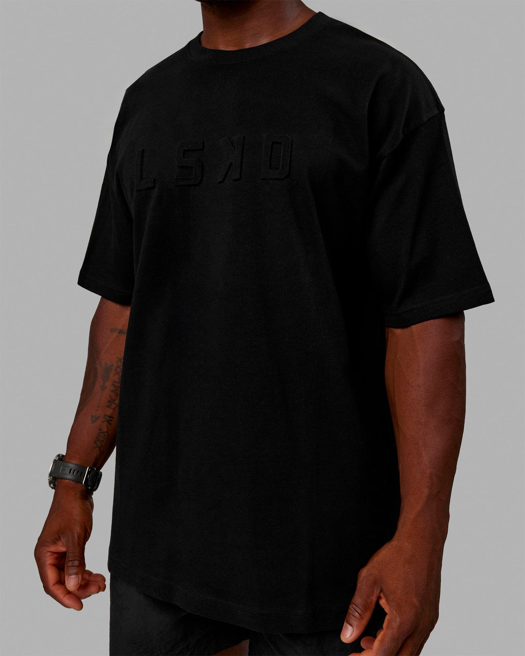 Man wearing Unisex Stamped 2.0 Heavyweight Tee Oversize - Black - view 1