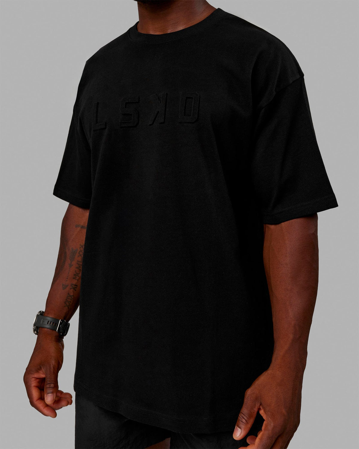 Man wearing Unisex Stamped 2.0 Heavyweight Tee Oversize - Black