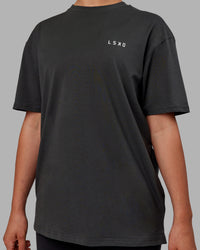 Woman wearing Unisex Strike Through FLXCotton Tee Oversize - Pirate Black-Black | Thumbnail Index: 8