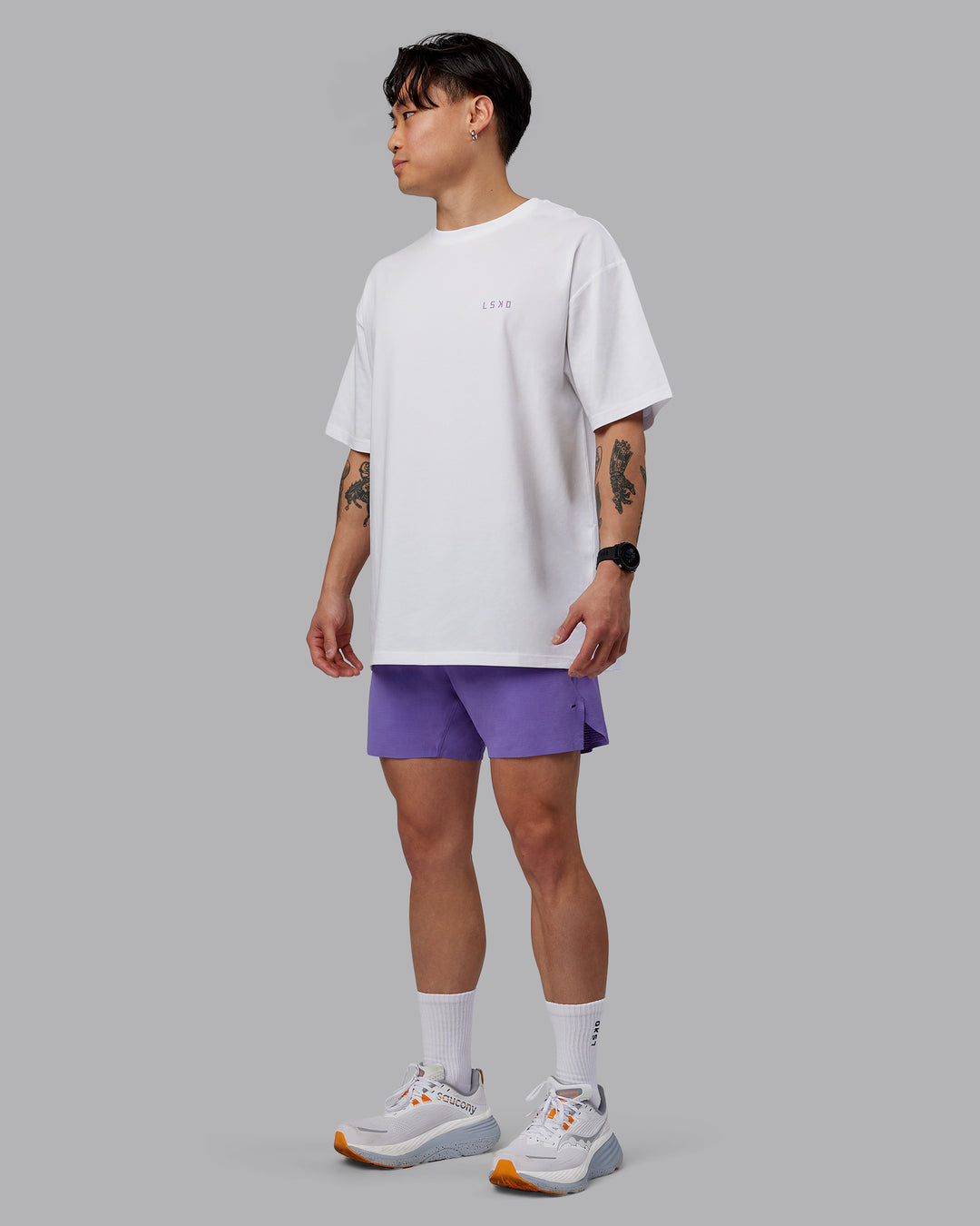 Man wearing Unisex Strike Through FLXCotton Tee Oversize - White-Purple Swirl - view 6