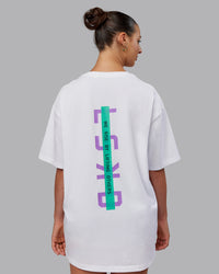 Woman wearing Unisex Strike Through FLXCotton Tee Oversize - White-Purple Swirl | Thumbnail Index: 6