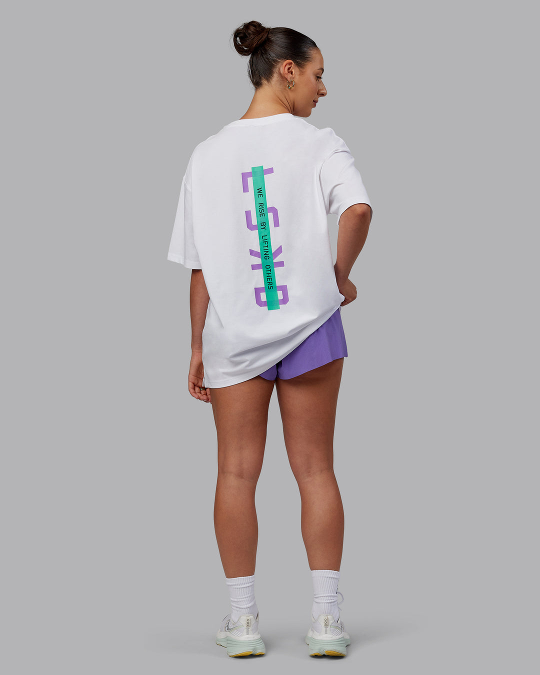 Woman wearing Unisex Strike Through FLXCotton Tee Oversize - White-Purple Swirl - view 12