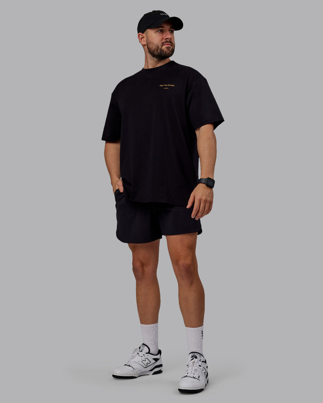 Man wearing Unisex Trust The Process 2.0 FLXCotton Tee Oversize - Black-Vibrant Orange - view 10
