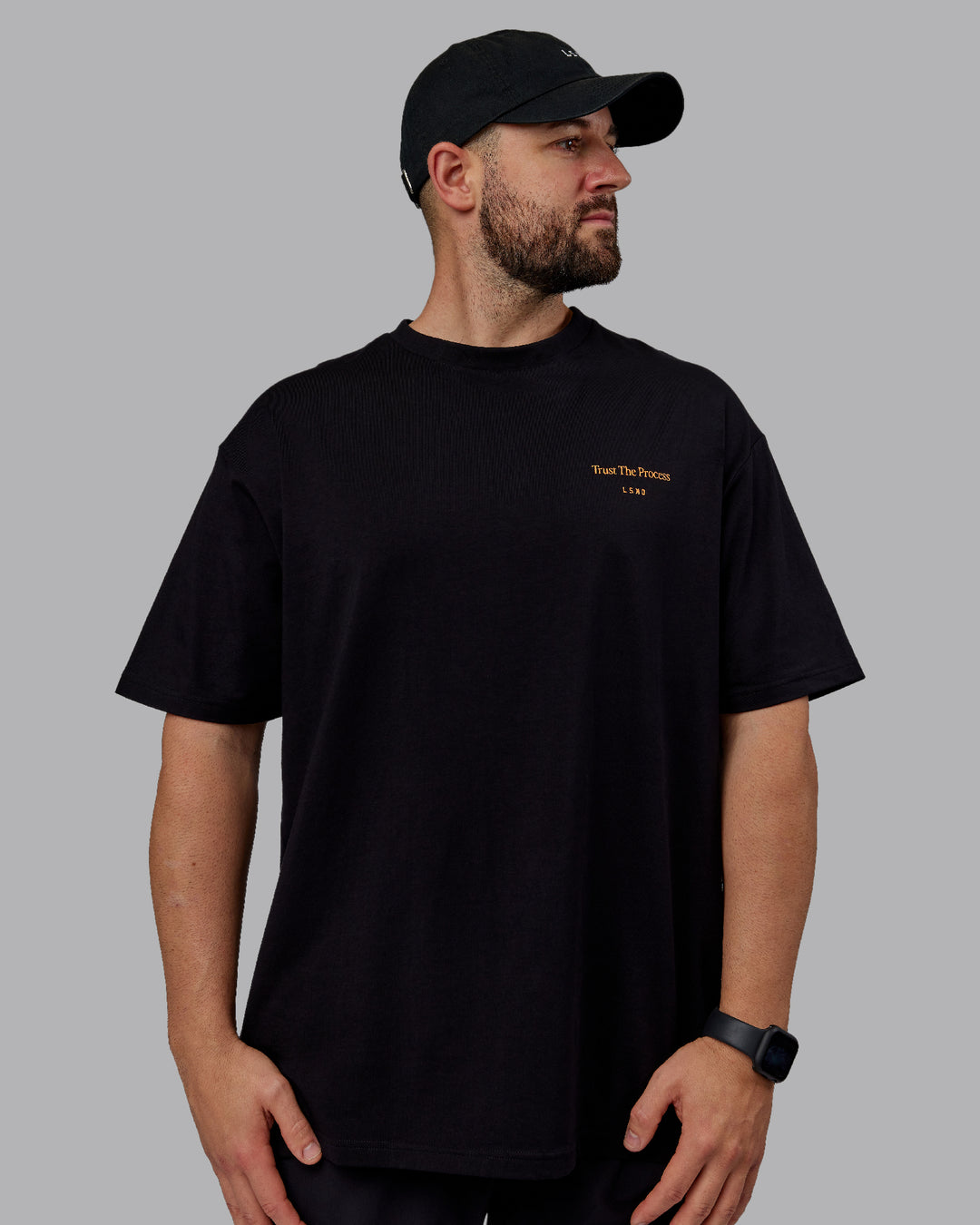 Man wearing Unisex Trust The Process 2.0 FLXCotton Tee Oversize - Black-Vibrant Orange - view 3