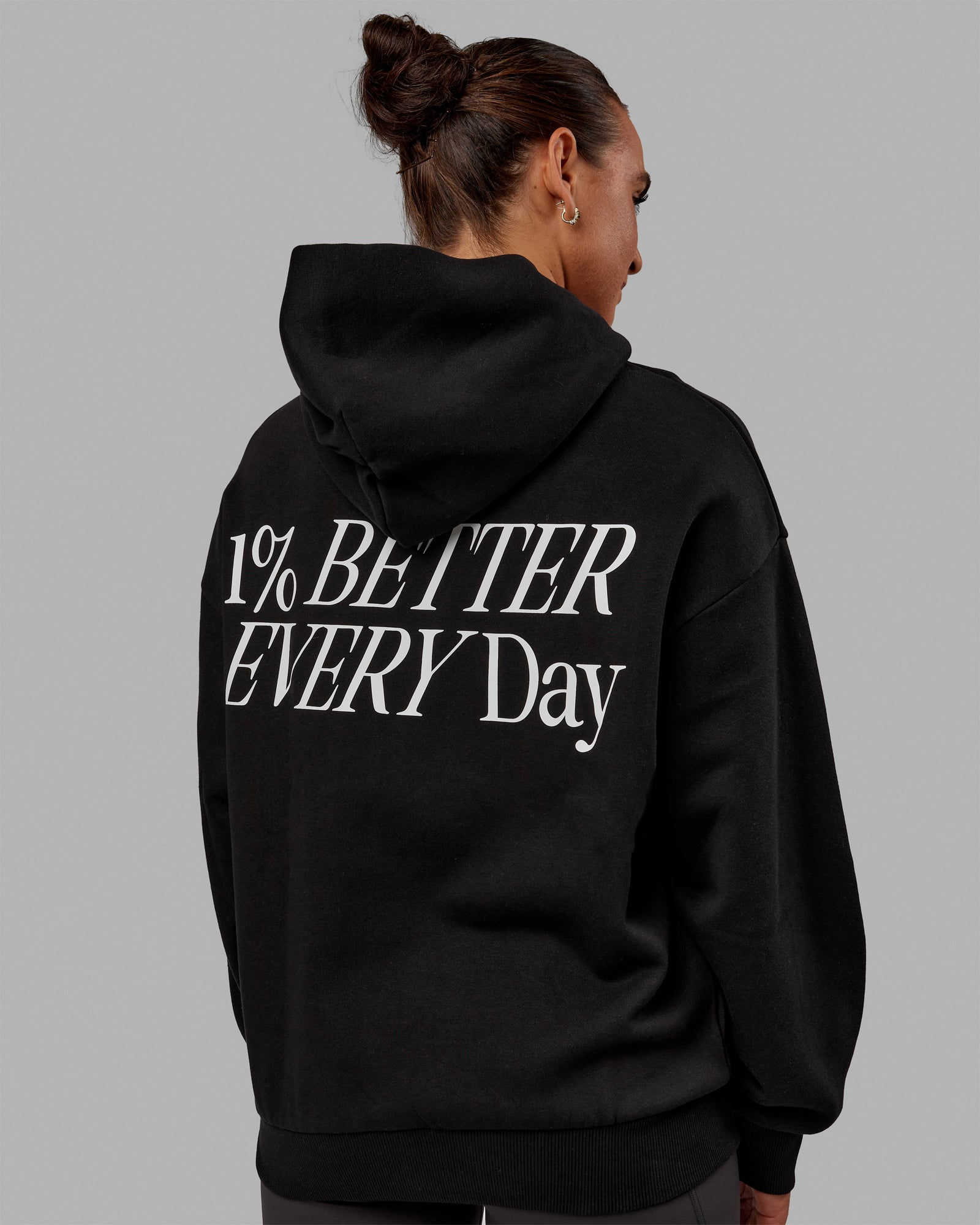 Woman wearing Unisex VS6 Hoodie Oversize - Black-White