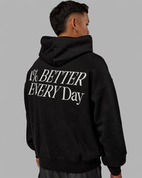 Man wearing Unisex VS6 Hoodie Oversize - Black-White | Thumbnail Index: 6
