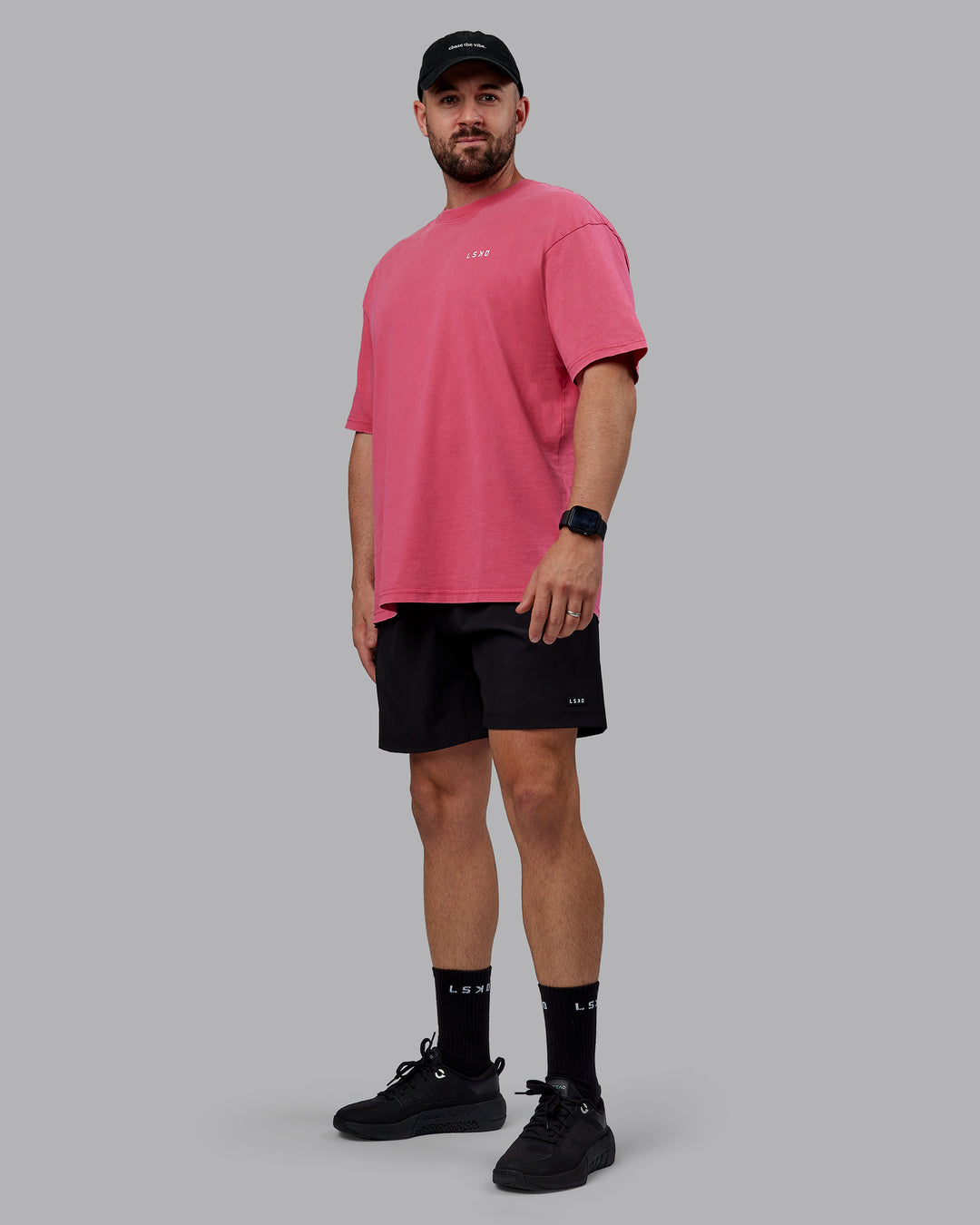 Man wearing Unisex Washed Empower Tee Oversize - Berry Pink-Pastel Orchid - view 11