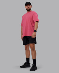 Man wearing Unisex Washed Empower Tee Oversize - Berry Pink-Pastel Orchid | Thumbnail Index: 10