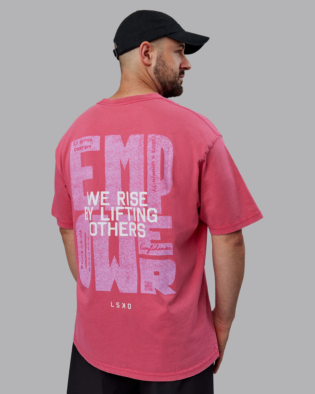Man wearing Unisex Washed Empower Tee Oversize - Berry Pink-Pastel Orchid - view 8