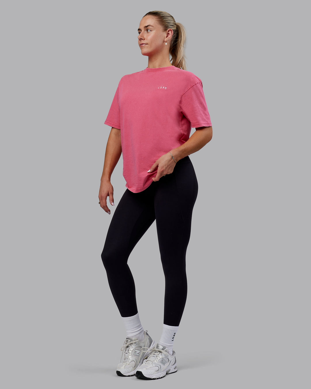 Woman wearing Unisex Washed Empower Tee Oversize - Berry Pink-Pastel Orchid - view 7