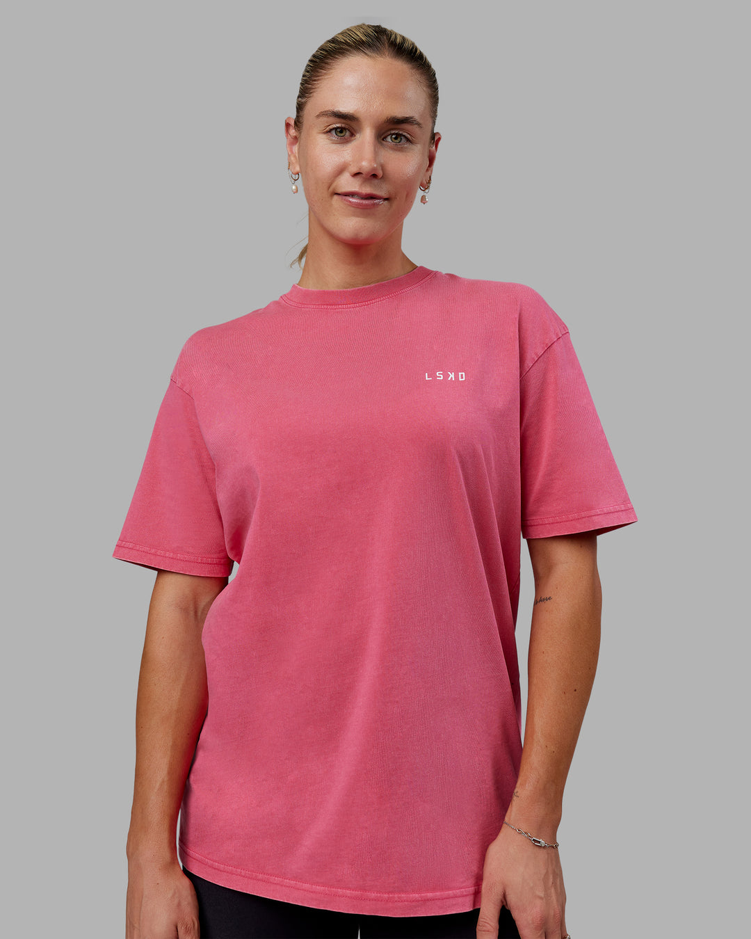 Woman wearing Unisex Washed Empower Tee Oversize - Berry Pink-Pastel Orchid - view 4