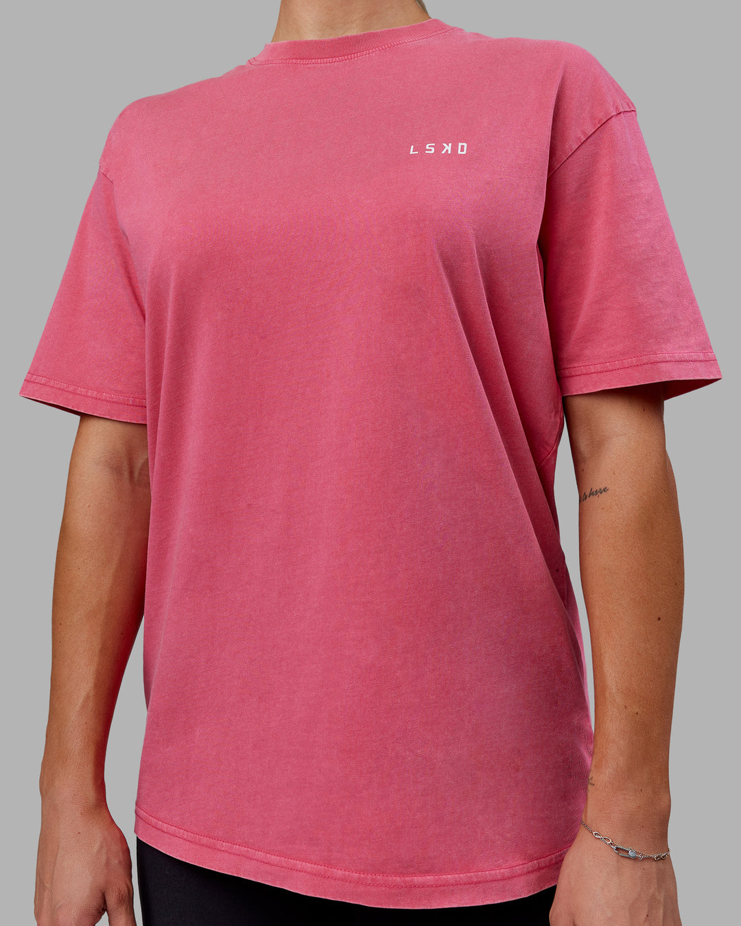 Woman wearing Unisex Washed Empower Tee Oversize - Berry Pink-Pastel Orchid - view 10