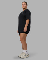Woman wearing Unisex Washed Empower Tee Oversize - Black-Berry Pink | Thumbnail Index: 6