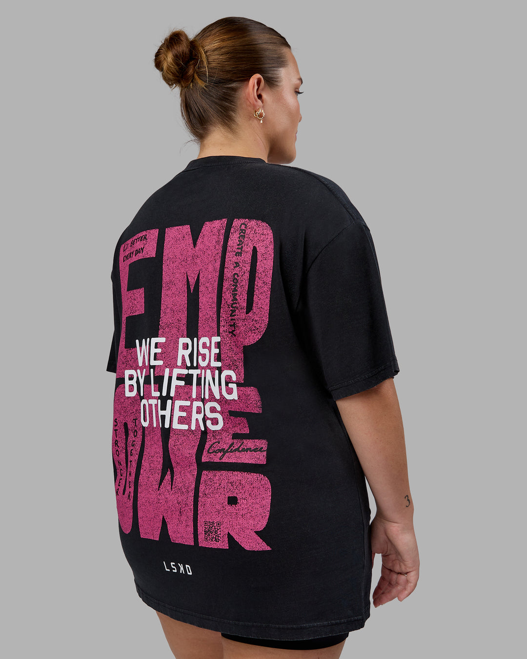 Woman wearing Unisex Washed Empower Tee Oversize - Black-Berry Pink - view 6