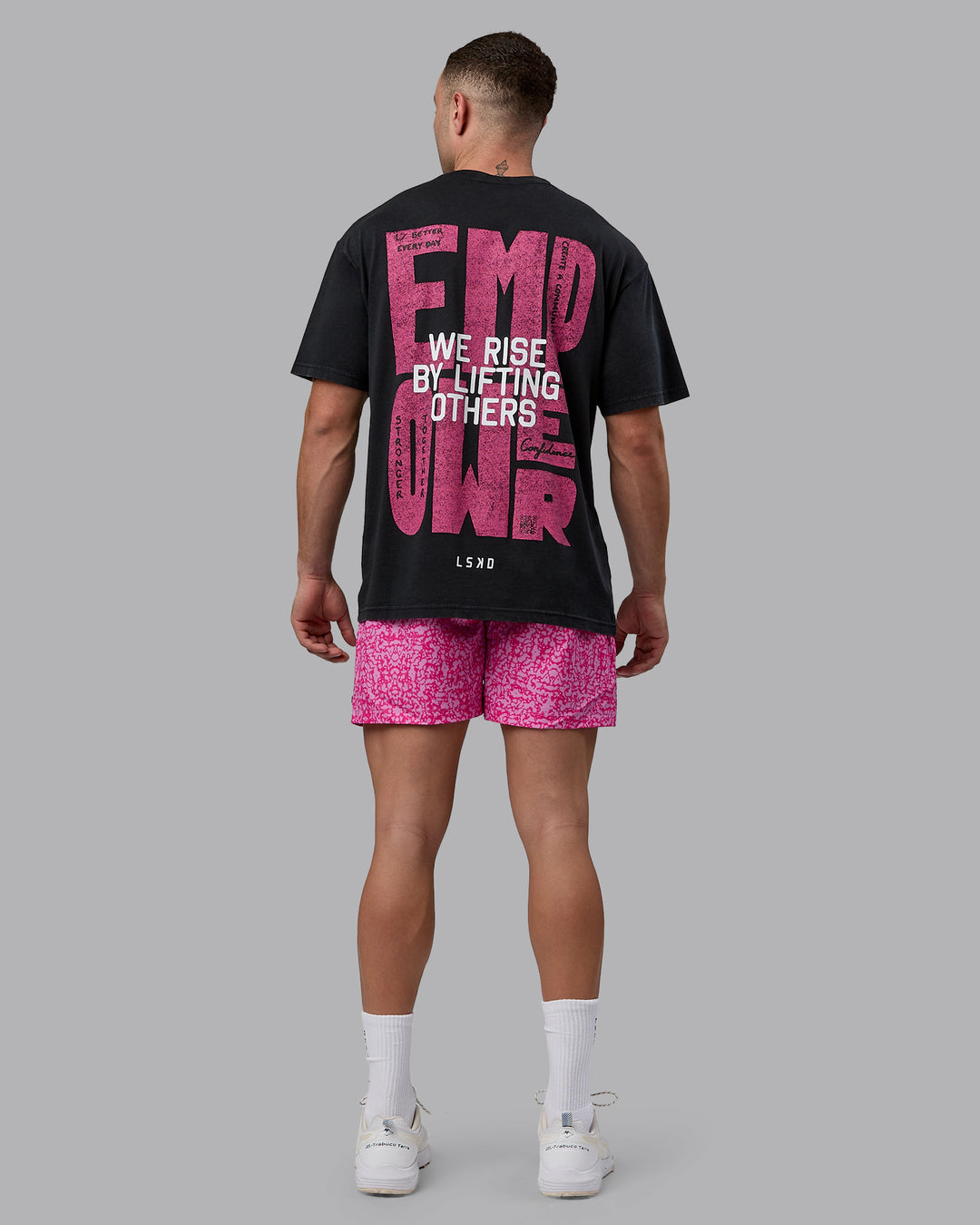 Man wearing Unisex Washed Empower Tee Oversize - Black-Berry Pink - view 12