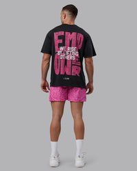 Man wearing Unisex Washed Empower Tee Oversize - Black-Berry Pink | Thumbnail Index: 11