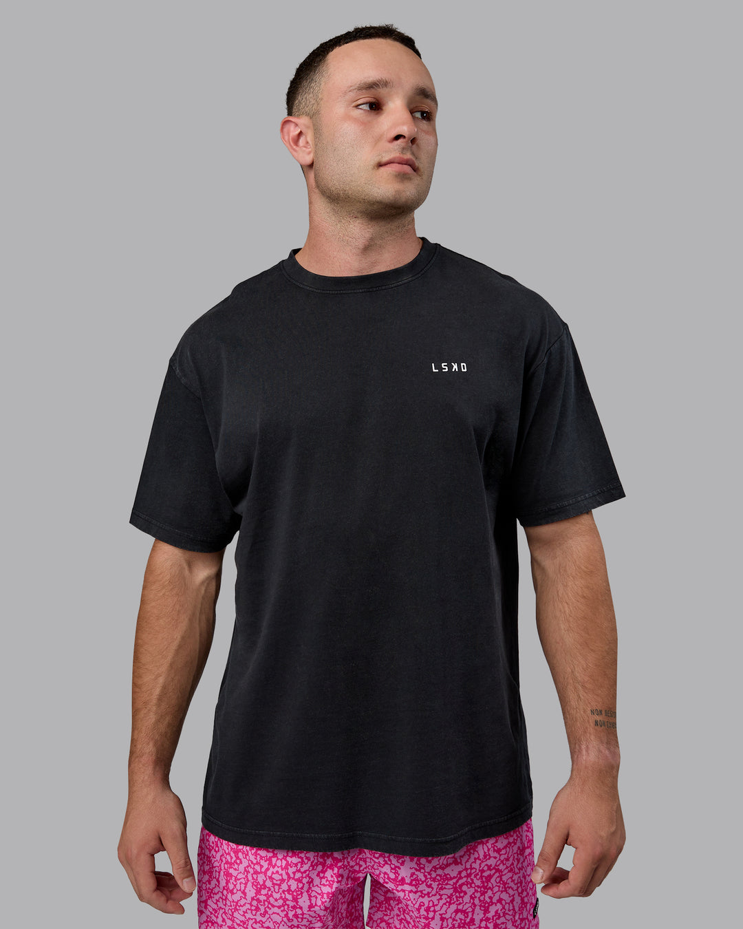 Man wearing Unisex Washed Empower Tee Oversize - Black-Berry Pink - view 3