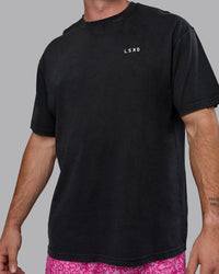 Man wearing Unisex Washed Empower Tee Oversize - Black-Berry Pink | Thumbnail Index: 8