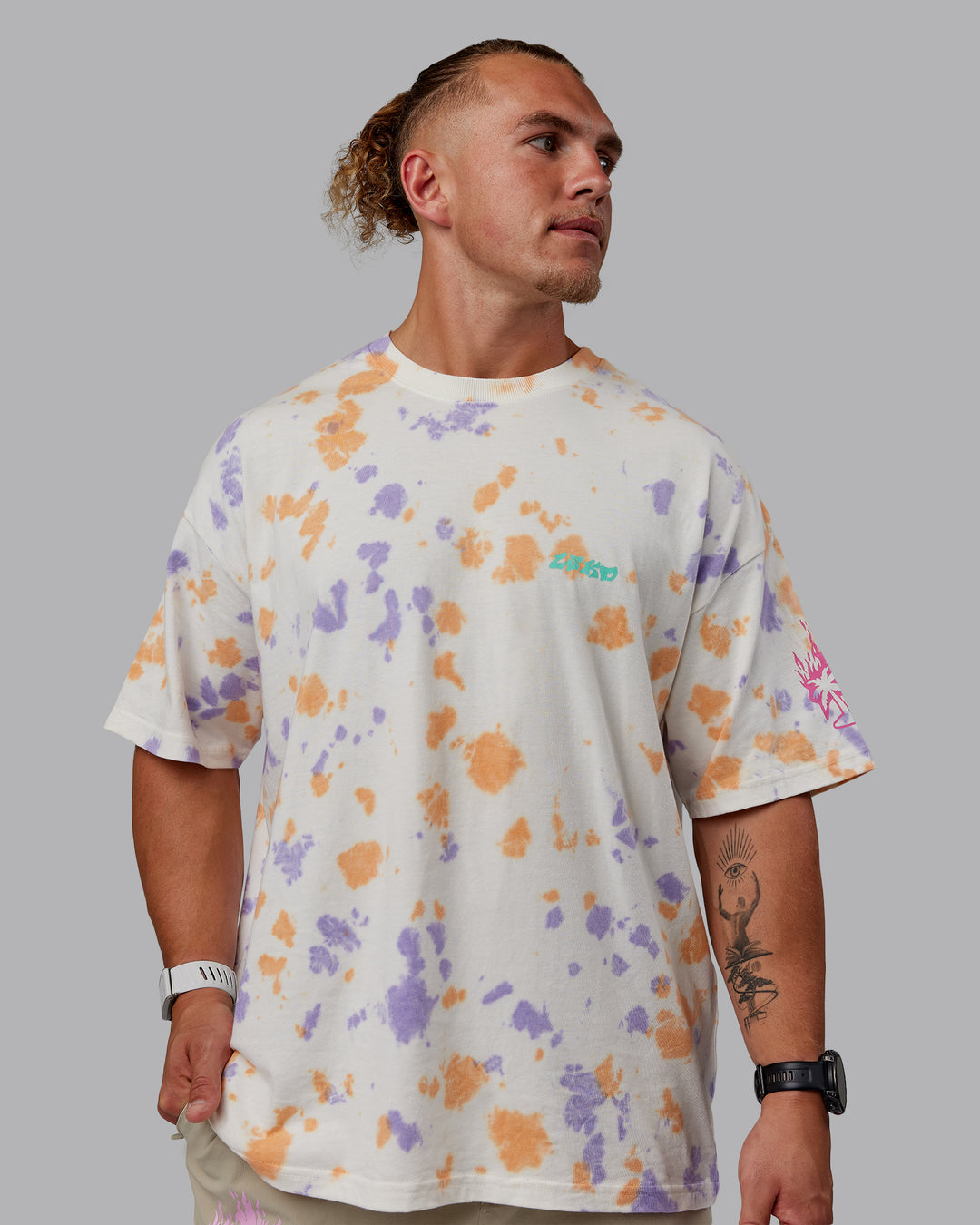 Man wearing Unisex Washed Huntington 24 Heavyweight Tee Oversize - Tie Dye Tangerine-Dahlia Purple - view 4