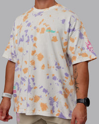 Man wearing Unisex Washed Huntington 24 Heavyweight Tee Oversize - Tie Dye Tangerine-Dahlia Purple | Thumbnail Index: 10