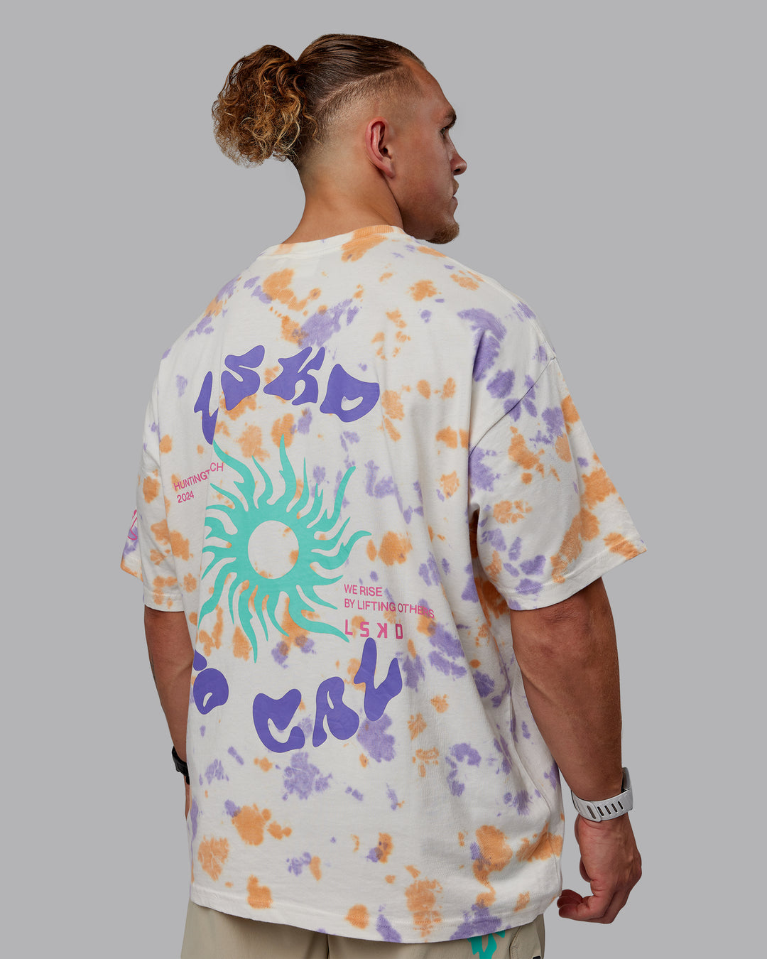 Man wearing Unisex Washed Huntington 24 Heavyweight Tee Oversize - Tie Dye Tangerine-Dahlia Purple - view 12