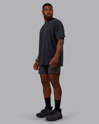 Man wearing Unisex Washed RUN CLUB FLXCotton Tee Oversize - Black-Black | Thumbnail Index: 8
