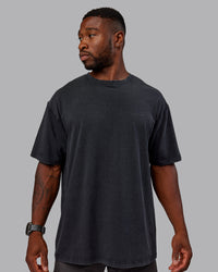 Man wearing Unisex Washed RUN CLUB FLXCotton Tee Oversize - Black-Black | Thumbnail Index: 4