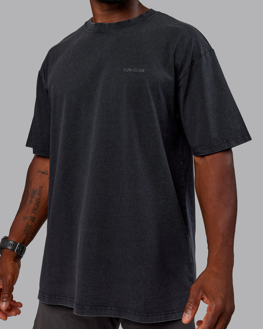 Man wearing Unisex Washed RUN CLUB FLXCotton Tee Oversize - Black-Black - view 10