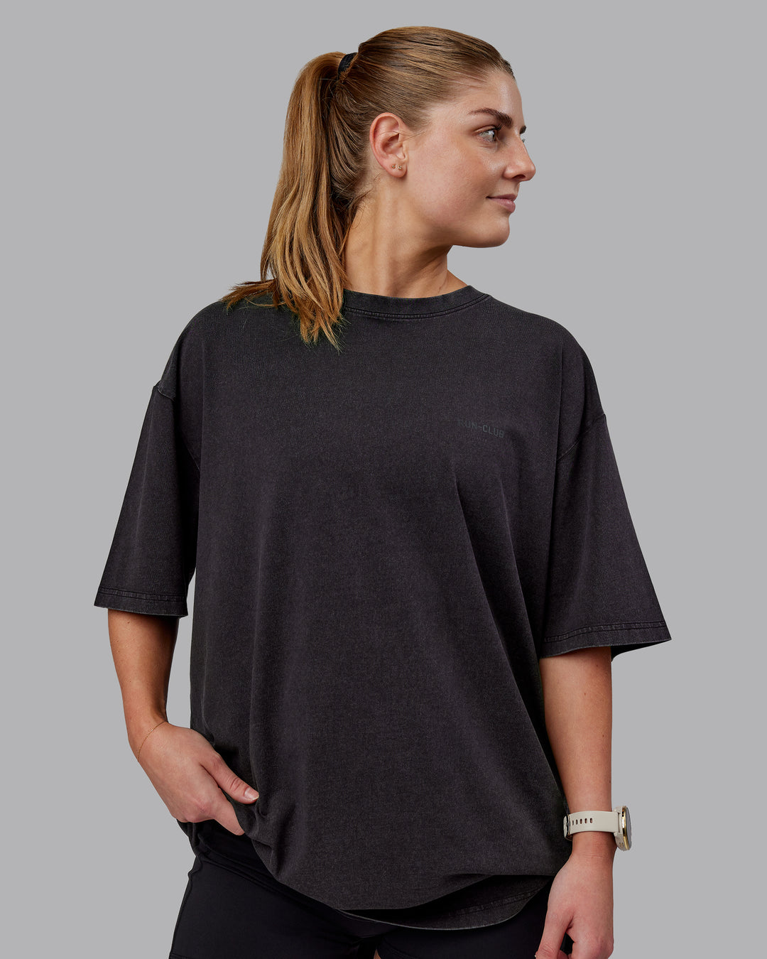 Woman wearing Unisex Washed RUN CLUB FLXCotton Tee Oversize - Black-Black - view 3