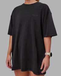 Woman wearing Unisex Washed RUN CLUB FLXCotton Tee Oversize - Black-Black | Thumbnail Index: 10