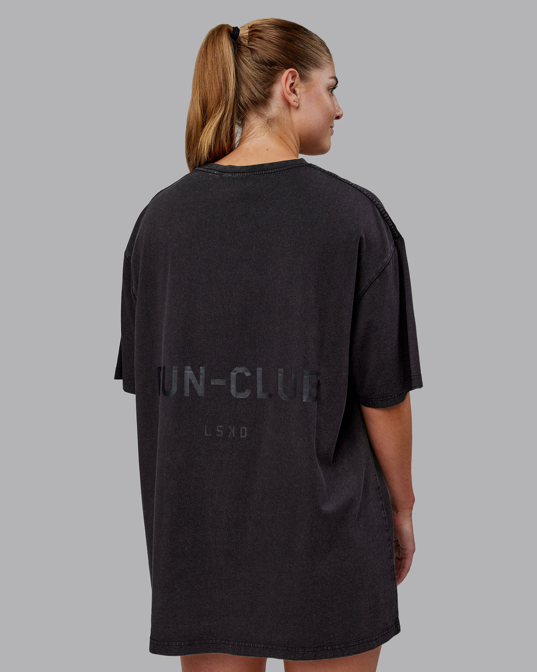 Man wearing Unisex Washed RUN CLUB FLXCotton Tee Oversize - Black-Black - view 4