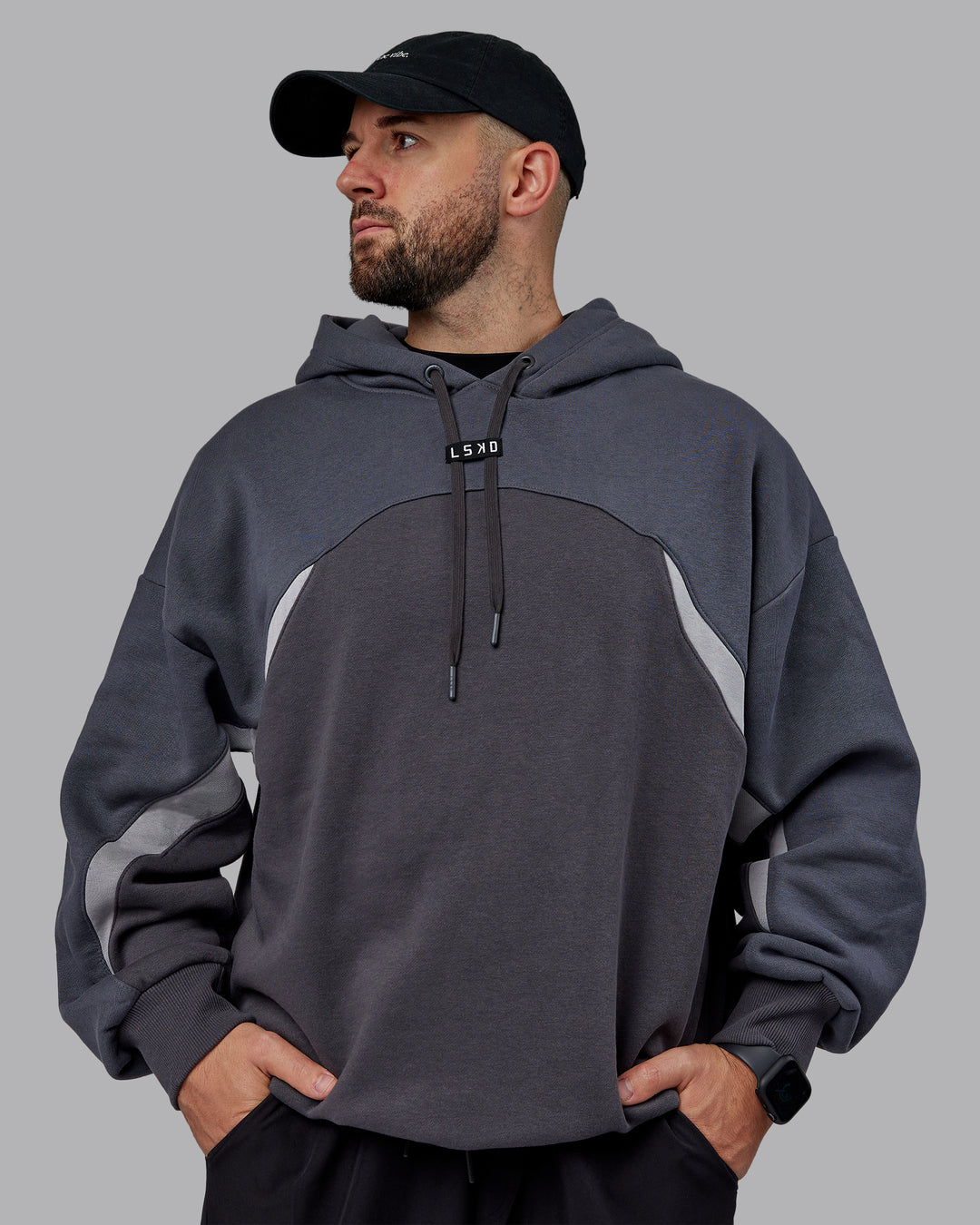 Man wearing Unisex Y2K Concept Panel Hoodie - Asphalt-Turbulance - view 4