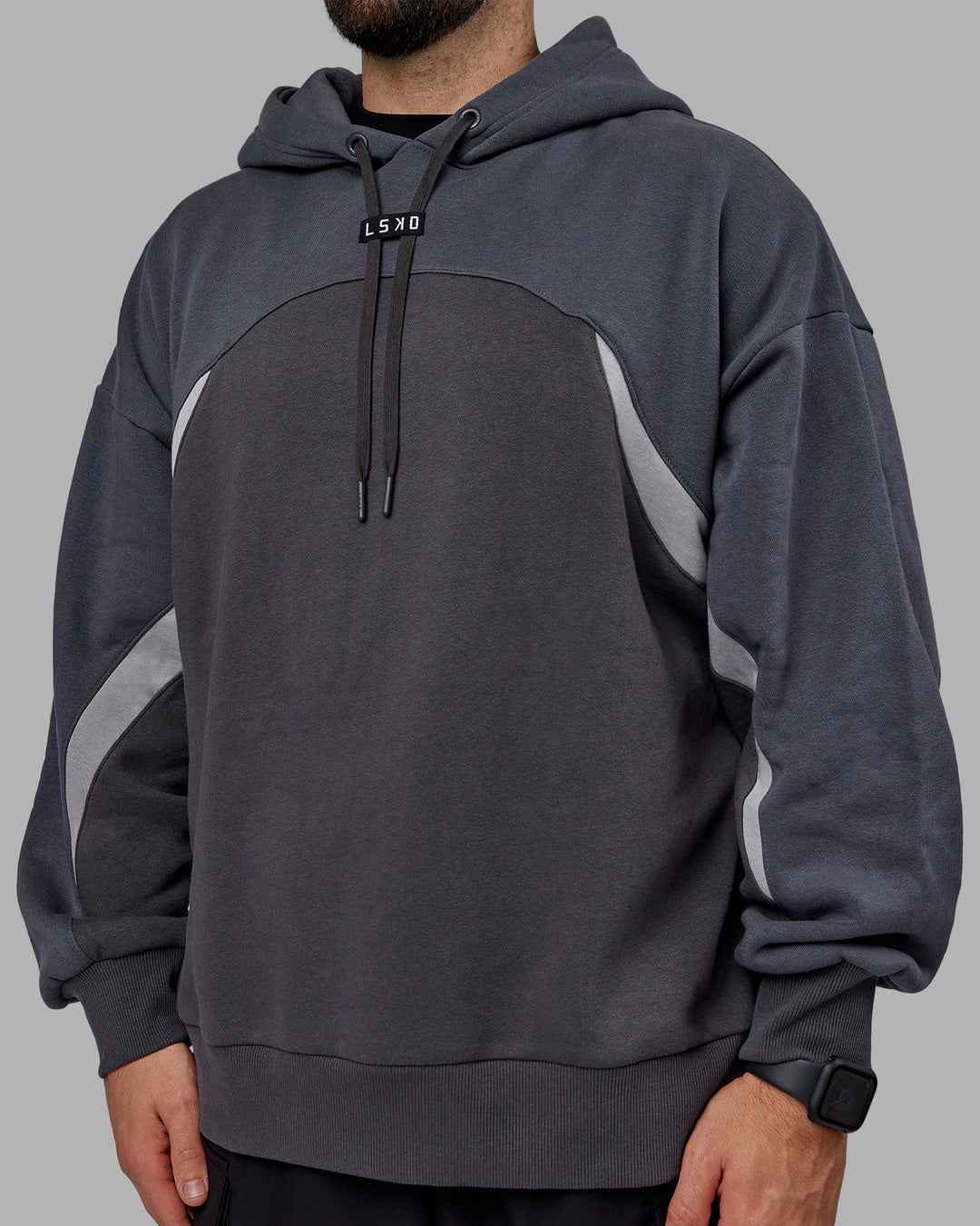 Man wearing Unisex Y2K Concept Panel Hoodie - Asphalt-Turbulance - view 11