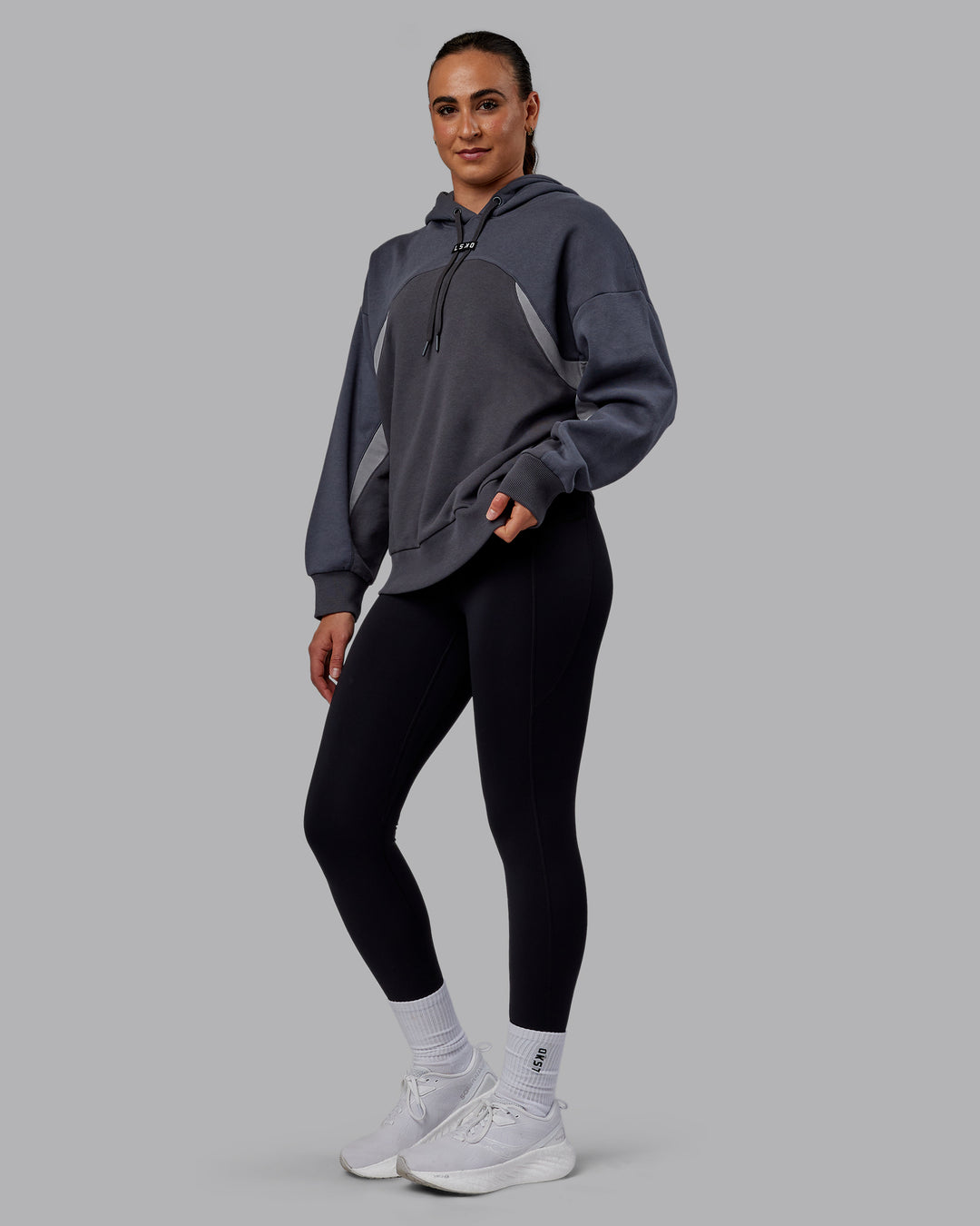 Woman wearing Unisex Y2K Concept Panel Hoodie - Asphalt-Turbulance - view 7