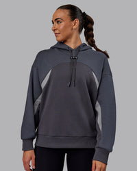 Woman wearing Unisex Y2K Concept Panel Hoodie - Asphalt-Turbulance | Thumbnail Index: 4