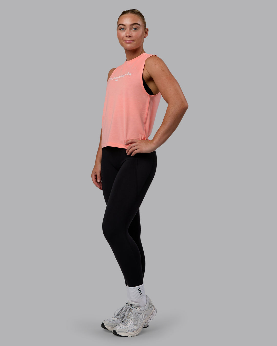 Woman wearing Unleash 1% Better Training Tank - Murex Shell-White - view 2