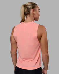 Woman wearing Unleash 1% Better Training Tank - Murex Shell-White | Thumbnail Index: 3