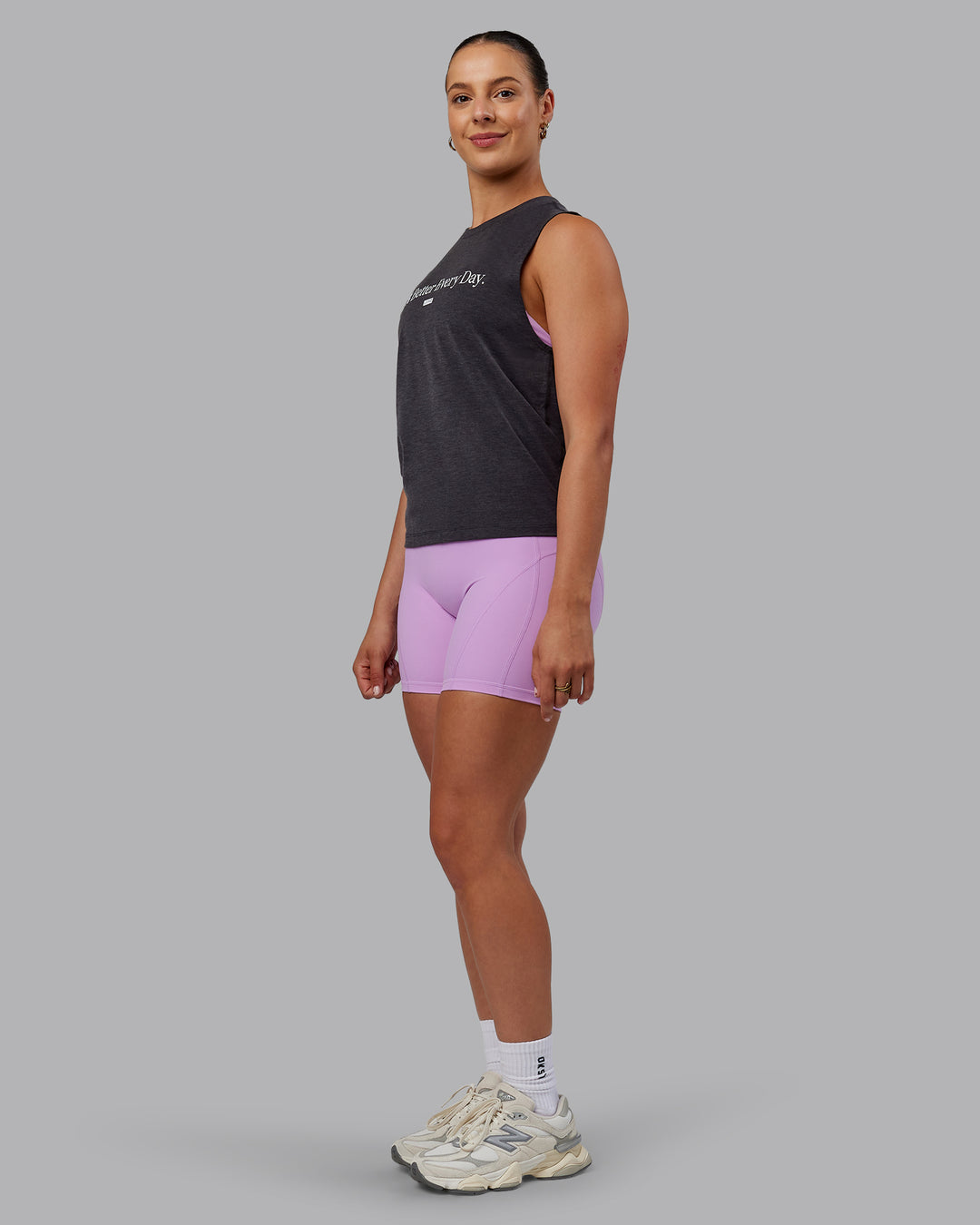 Woman wearing Unleash 1% Better Training Tank - Charcoal Marl-White - view 2