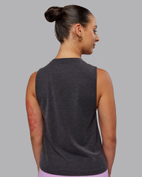 Woman wearing Unleash 1% Better Training Tank - Charcoal Marl-White | Thumbnail Index: 3