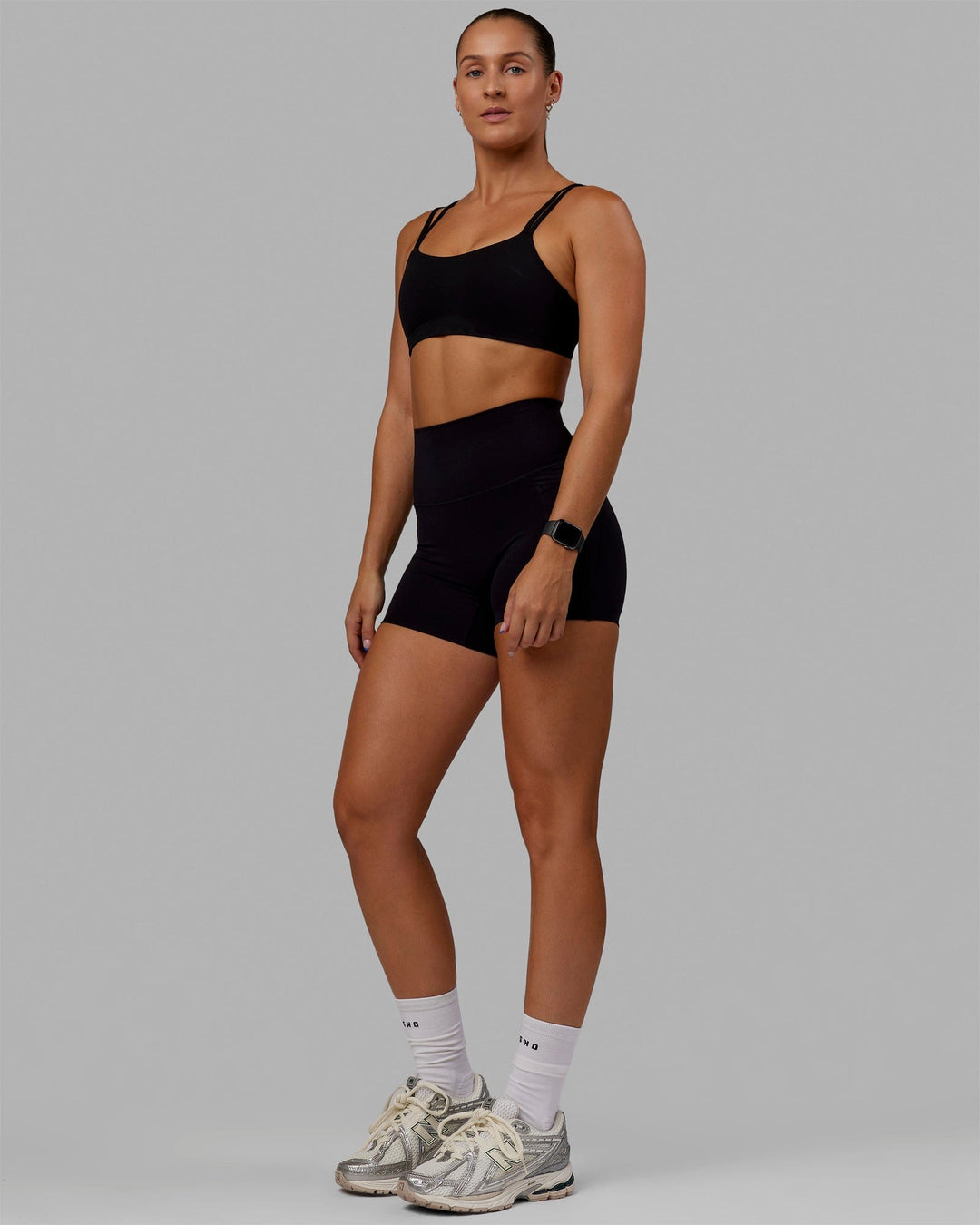 Woman wearing Vantage Sports Bra - Black - view 3