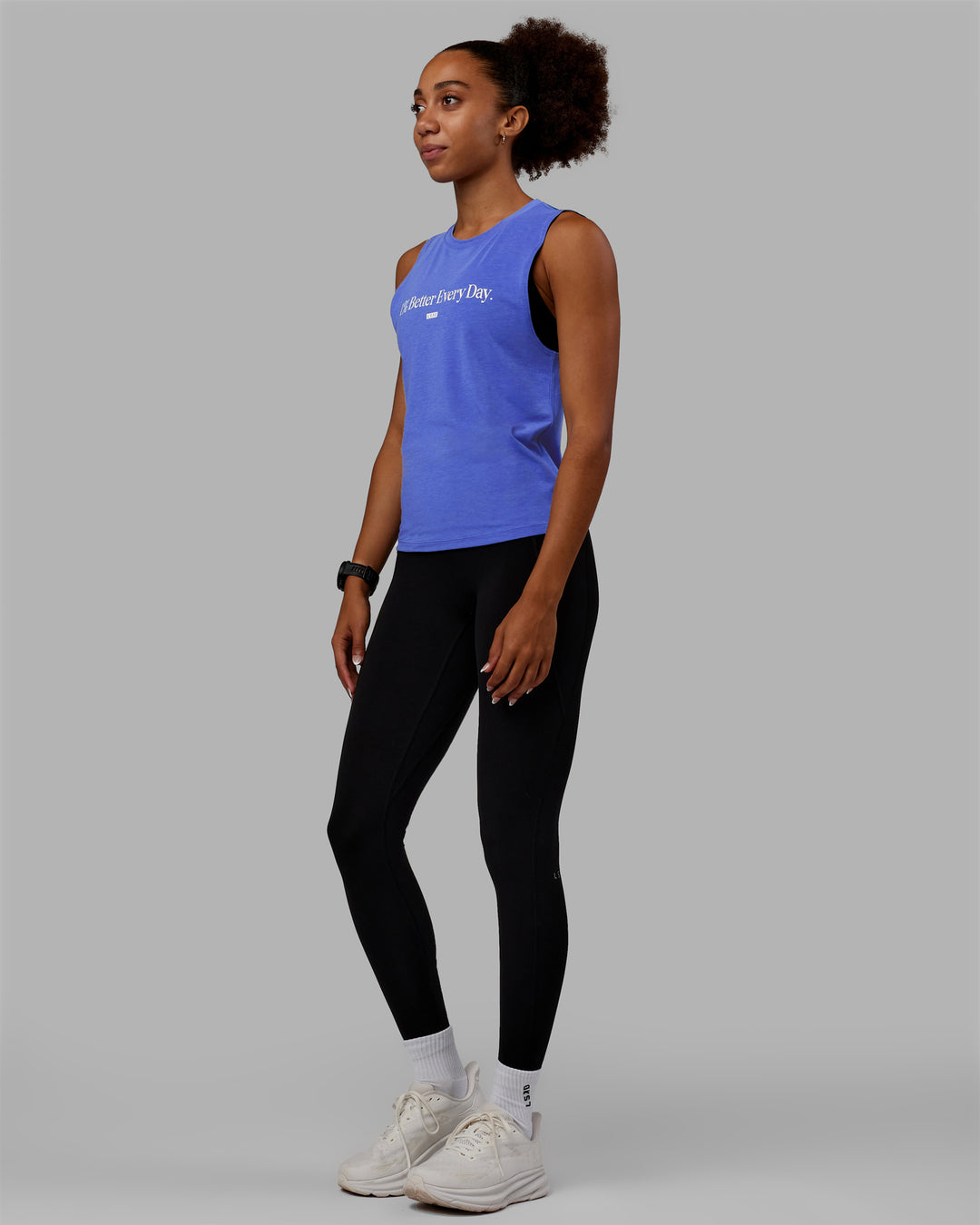 Woman wearing Vital 1% Better Training Tank - Power Cobalt-White - view 1
