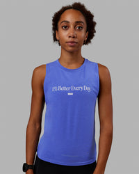 Woman wearing Vital 1% Better Training Tank - Power Cobalt-White | Thumbnail Index: 1