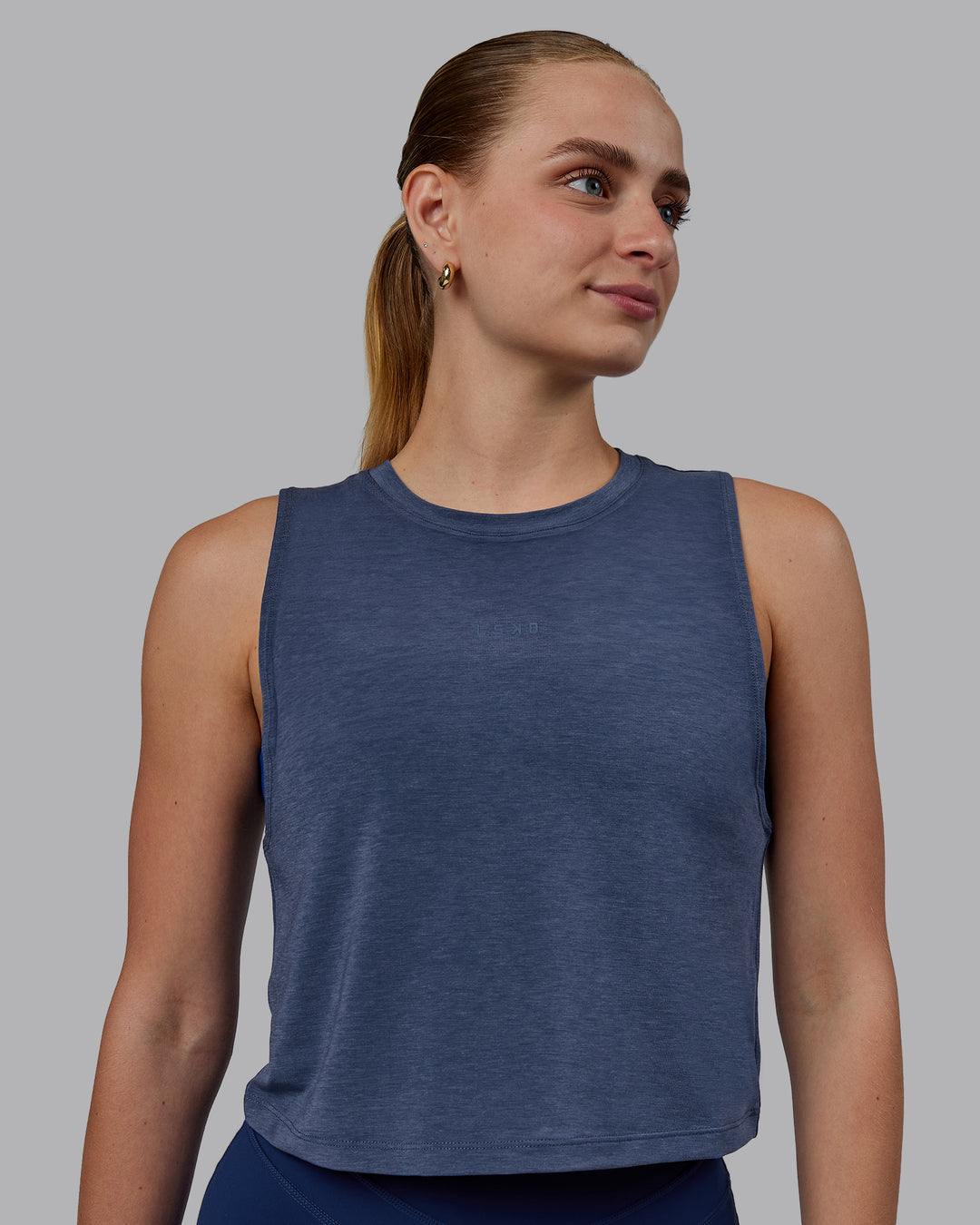 Woman wearing Vital Cropped Training Tank - Midnight Blue - view 2